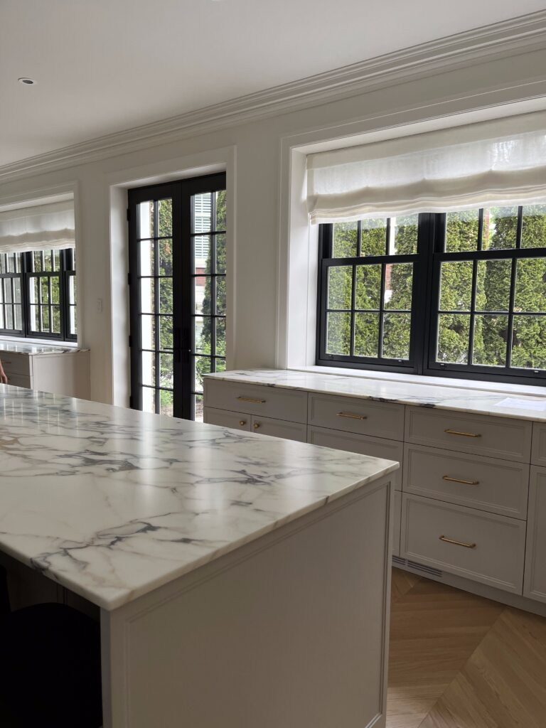 kitchen and windows with black wooden frames